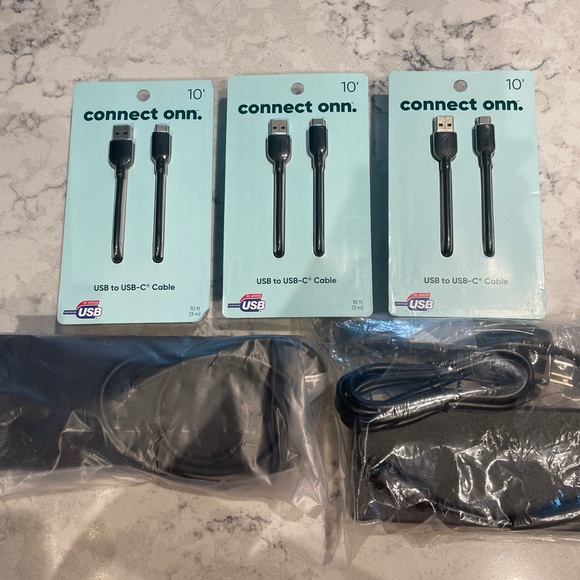 Three usb to usb c cable and two dell dock stations.